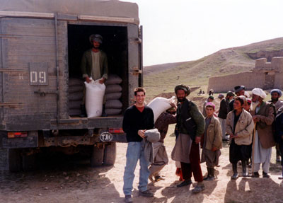 Sand distributing emergency food in Afghanistan