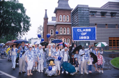 Members of the class of 1983 parade towards Walker for their reunion