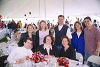 a group of reunioners stand together during a reception
