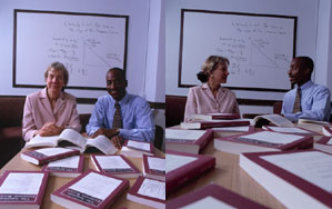 Jefferson sits with former professor Shirley Johnson-Lans in front of a white board