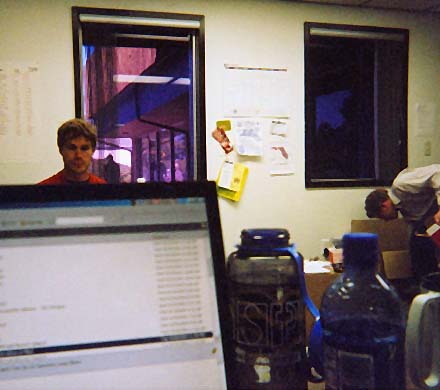 View of the MoveOn office from behind my laptop.  Person directly across from me is Trevor Laird, another field organizer.