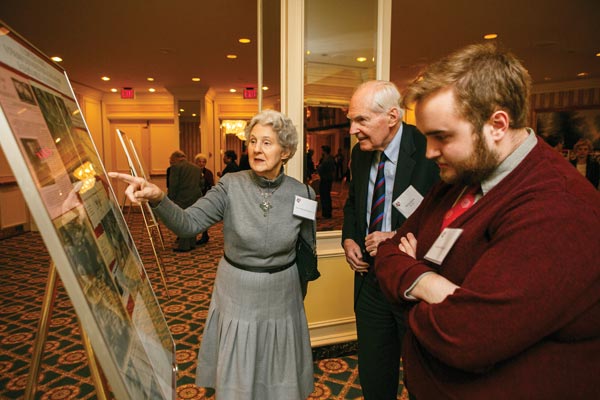 Patricia “Twiss” Maynard Butler ‘52 shows clippings about past VCDC events compiled by Alix Gould Myerson ‘71.