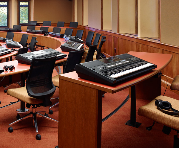 With individual keyboards at the ready, students learn music theory in a more hands-on way.