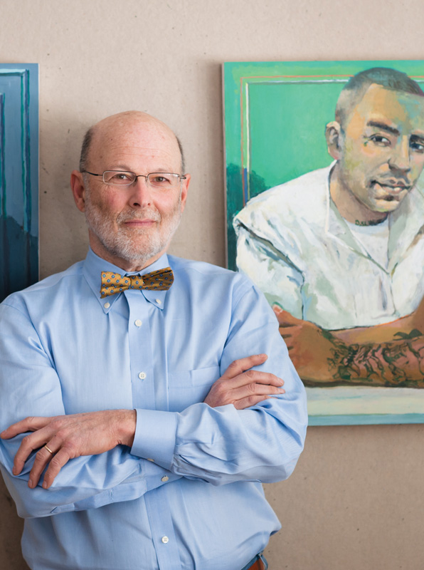 Professor Peter Charlap with his portrait of Robert Garza, who was executed last year.