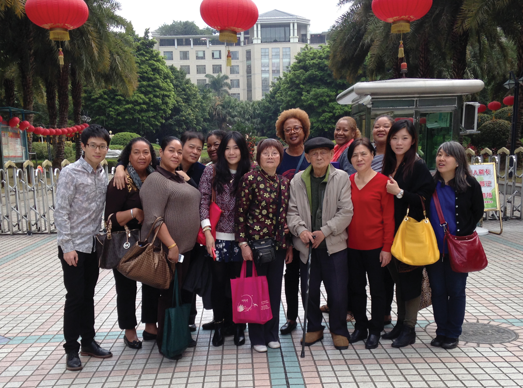 Paula Williams Madison '74, center, and family celebrate the Lunar New Year in Guangzhou, China. 