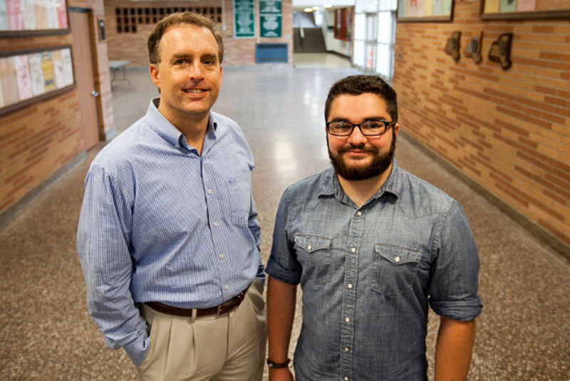 Education professor Chris Bjork and Ford Scholar Kyle DeAngelis '15.