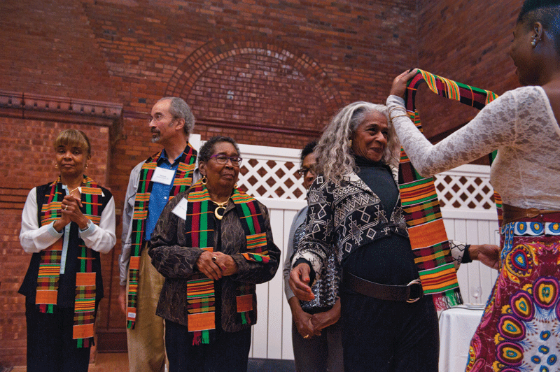 Ceremonial Kente cloths were bestowed on founding members of AAAVC.